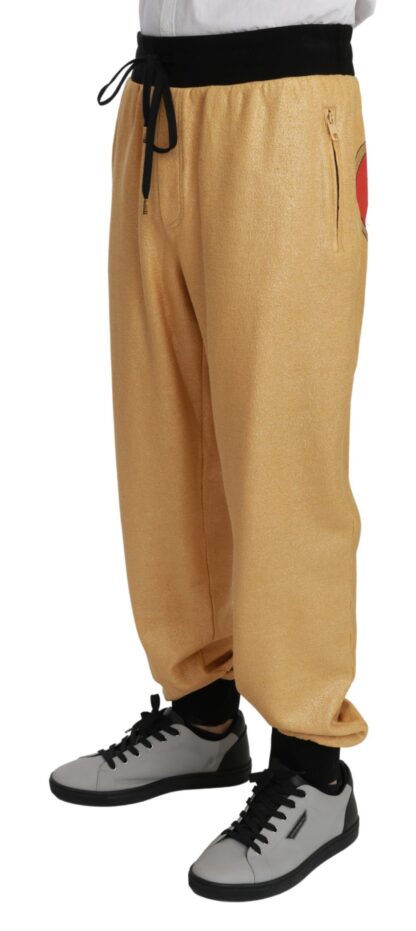 Dolce & Gabbana - Elegant Gold Motif Sweatpants