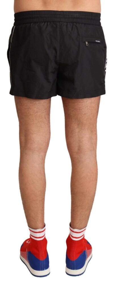 Dolce & Gabbana - Elegant Black KING Motive Swim Trunks