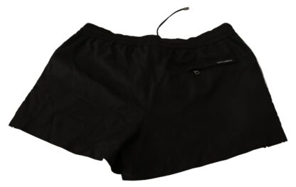 Dolce & Gabbana - Elegant Black KING Motive Swim Trunks