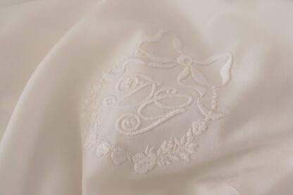 Dolce & Gabbana - Elegant Silk Top with Logo Embroidery